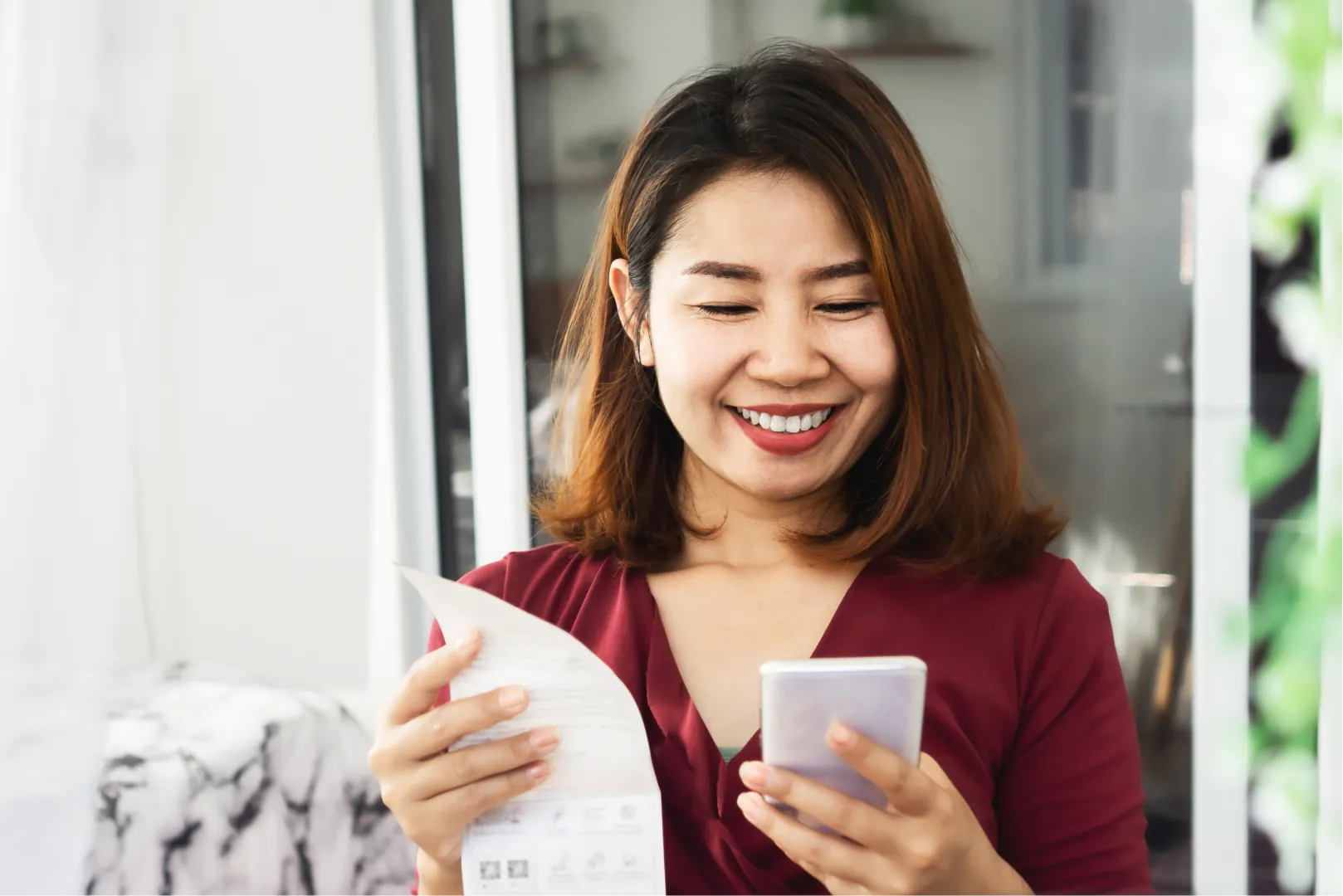 Woman holding receipt